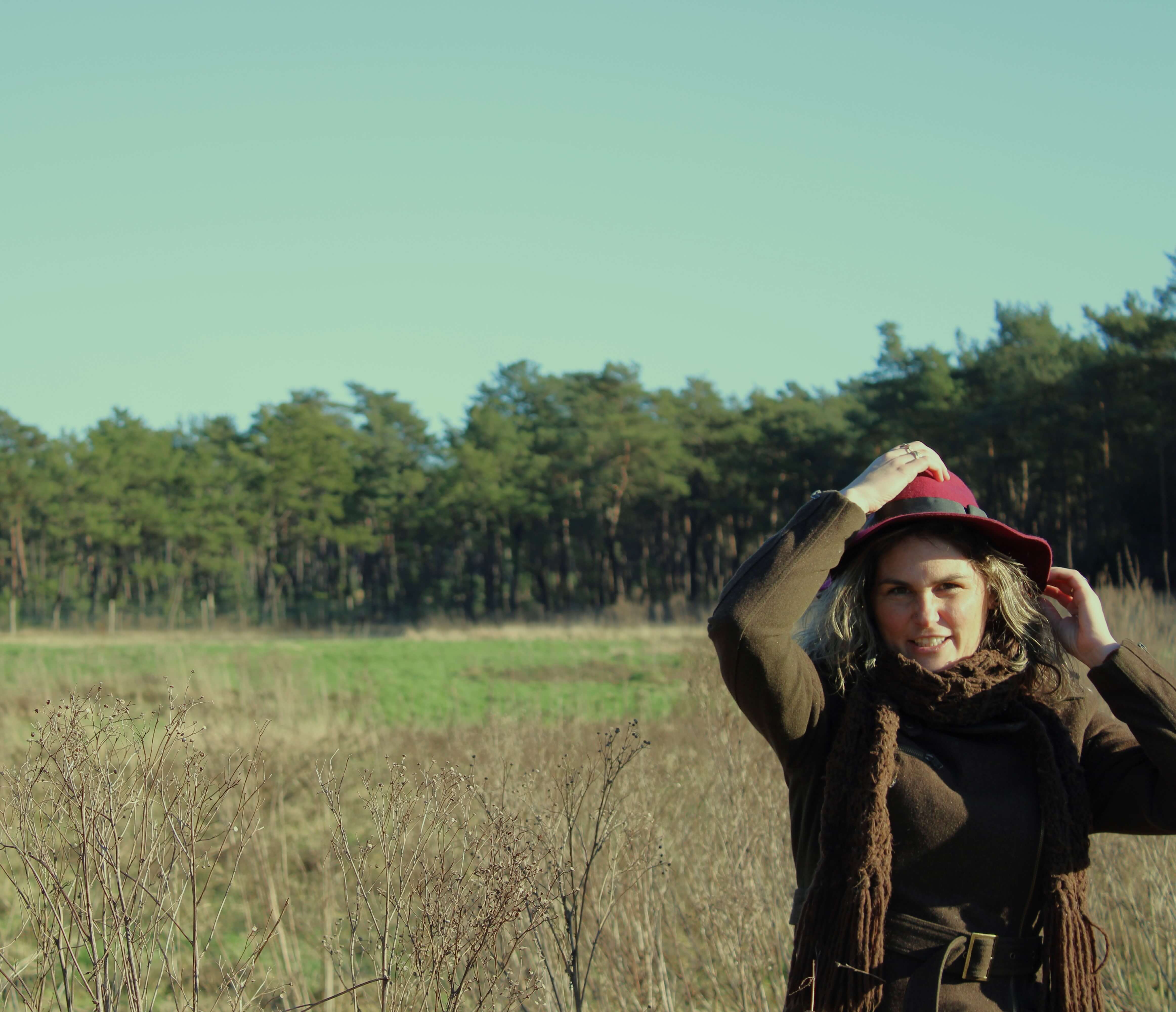 gabrielle with hat in forest